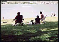 parents watch in the 
shade  (38 kb)